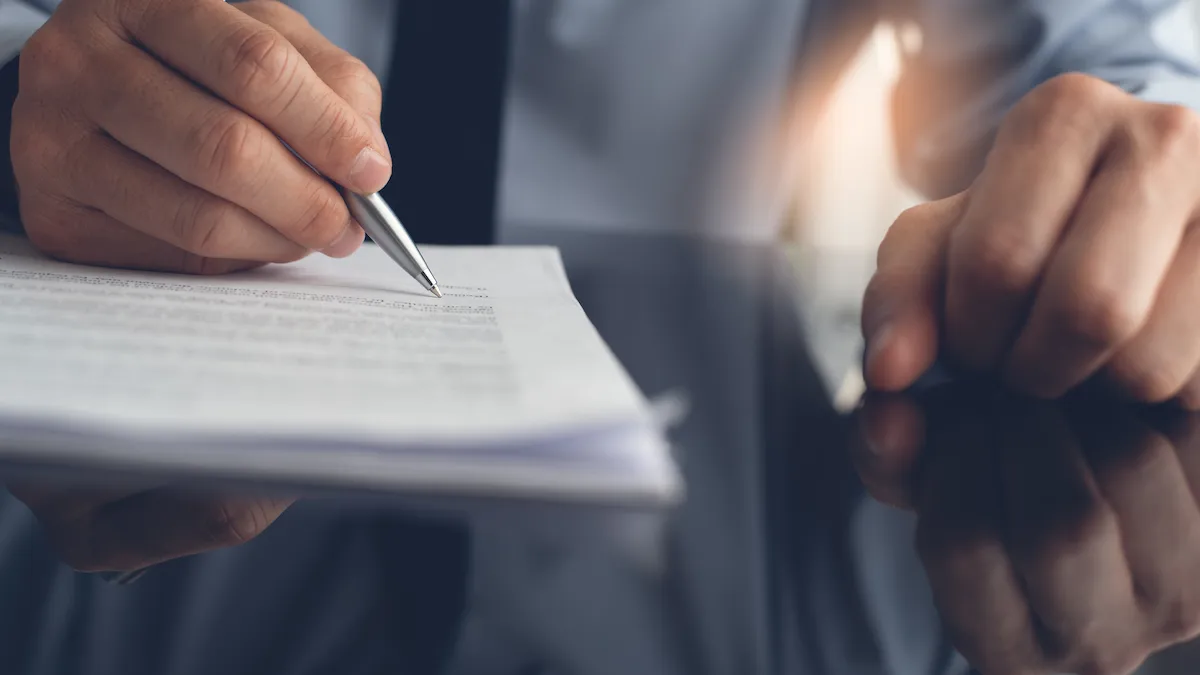 Illinois contractor and client reviewing a detailed written construction contract at a project site
