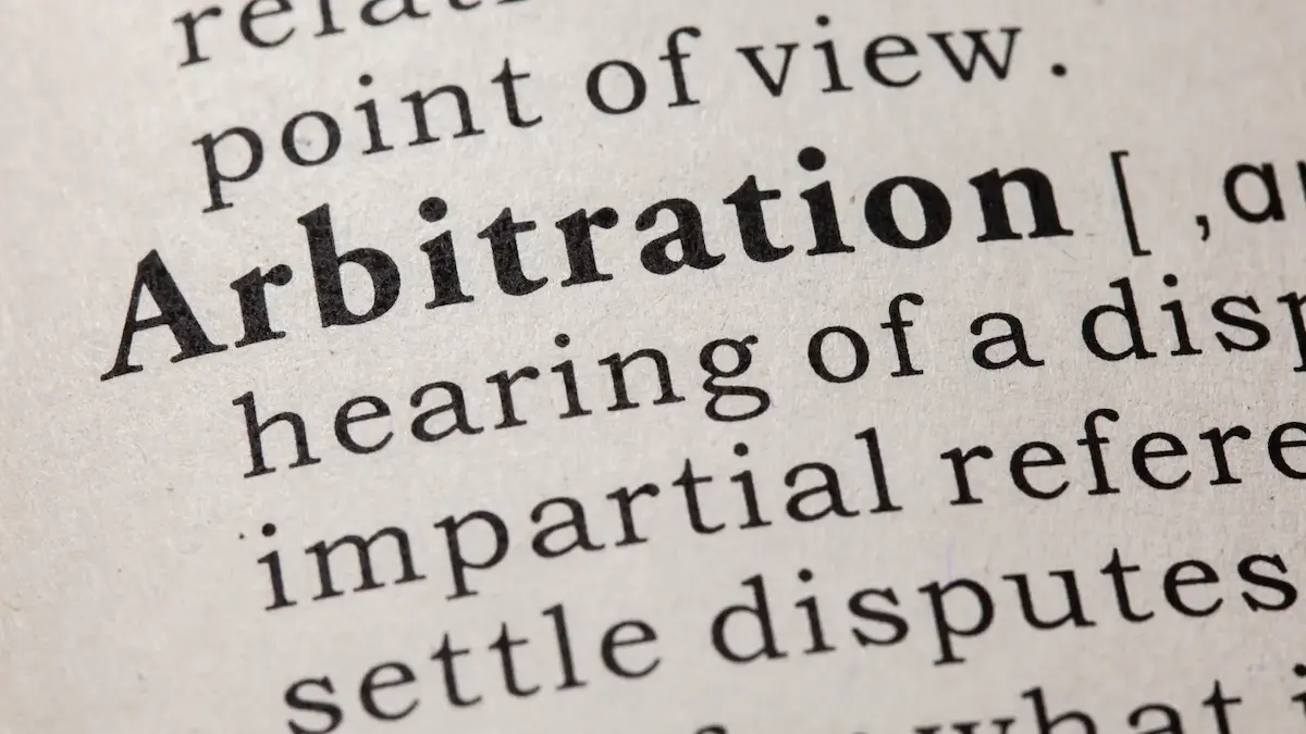 Dictionary definition of arbitration representing binding arbitration in Illinois construction disputes
