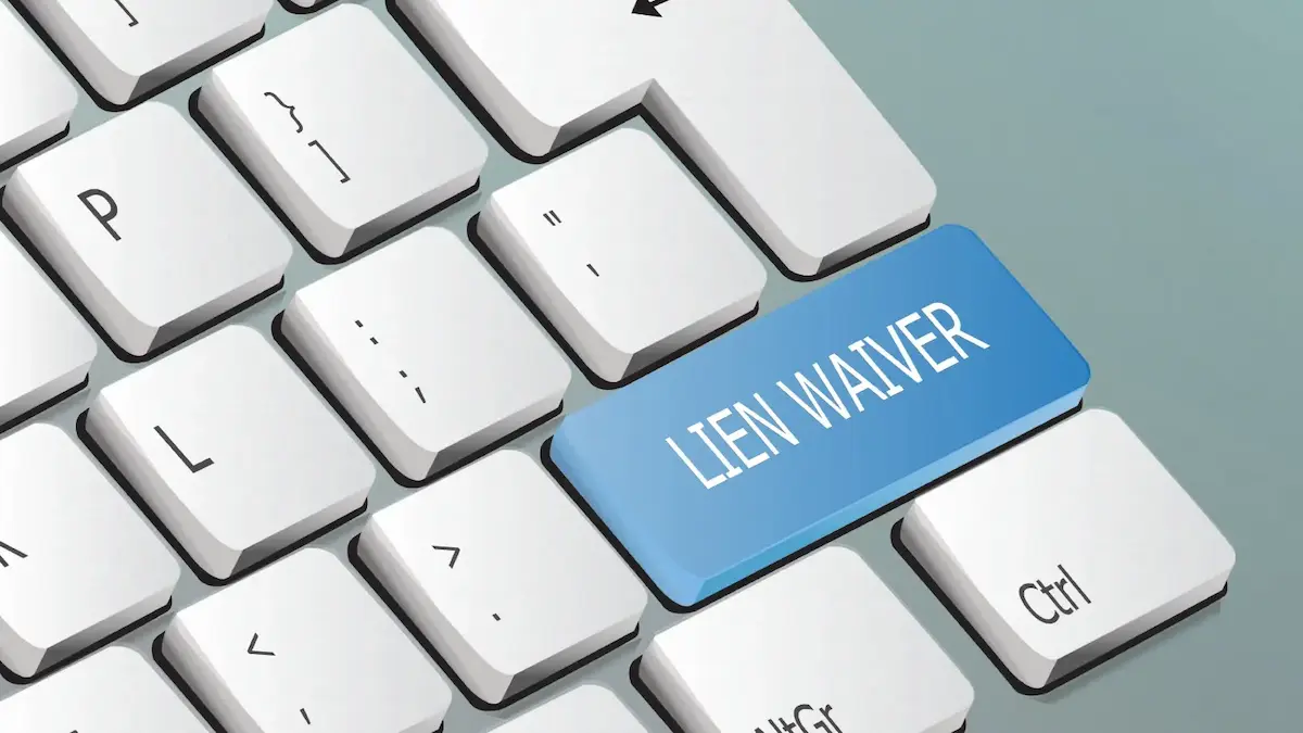 Keyboard with blue lien waiver key representing Illinois construction lien waiver requirements